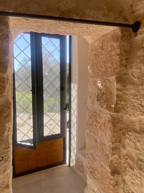 Interior - Ancient Saracen Trullo from the 1700s nestled in the green of Puglia's centuries-old olive grove (ostuni)
