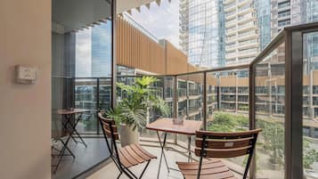 Departamento Deluxe, 1 habitación, balcón | Restaurante al aire libre