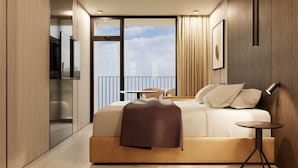 A modern hotel room with a large bed, a small table, a chair, and a balcony with a city view. - Resort Cupidon Neptun (Neptun)