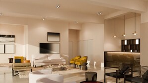 A modern living room with a white sofa, yellow chairs, and a coffee table. - Resort Cupidon Neptun (Neptun)