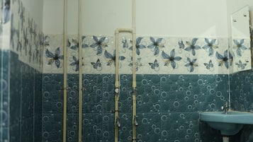 Shower, free toiletries, slippers, towels