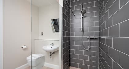Burnside Hideaway is a stylish two-bedroom, two-bathroom property located in the heart of Dornoch. Finished with a modern design while retaining a comfortable, welcoming feel, it offers the perfect home-away-from-home for guests.