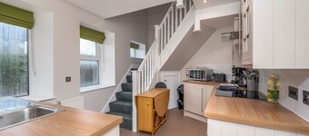 Burnside Hideaway is a stylish two-bedroom, two-bathroom property located in the heart of Dornoch. Finished with a modern design while retaining a comfortable, welcoming feel, it offers the perfect home-away-from-home for guests.