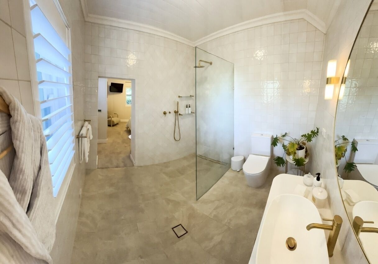 Shower, towels, soap, toilet paper