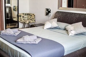 3 habitaciones, tabla de planchar con plancha, wifi y ropa de cama 