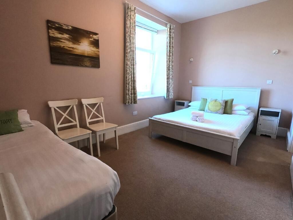 Comfort dubbelrum eller tvåbäddsrum - utsikt mot trädgården | Gratis wi-fi