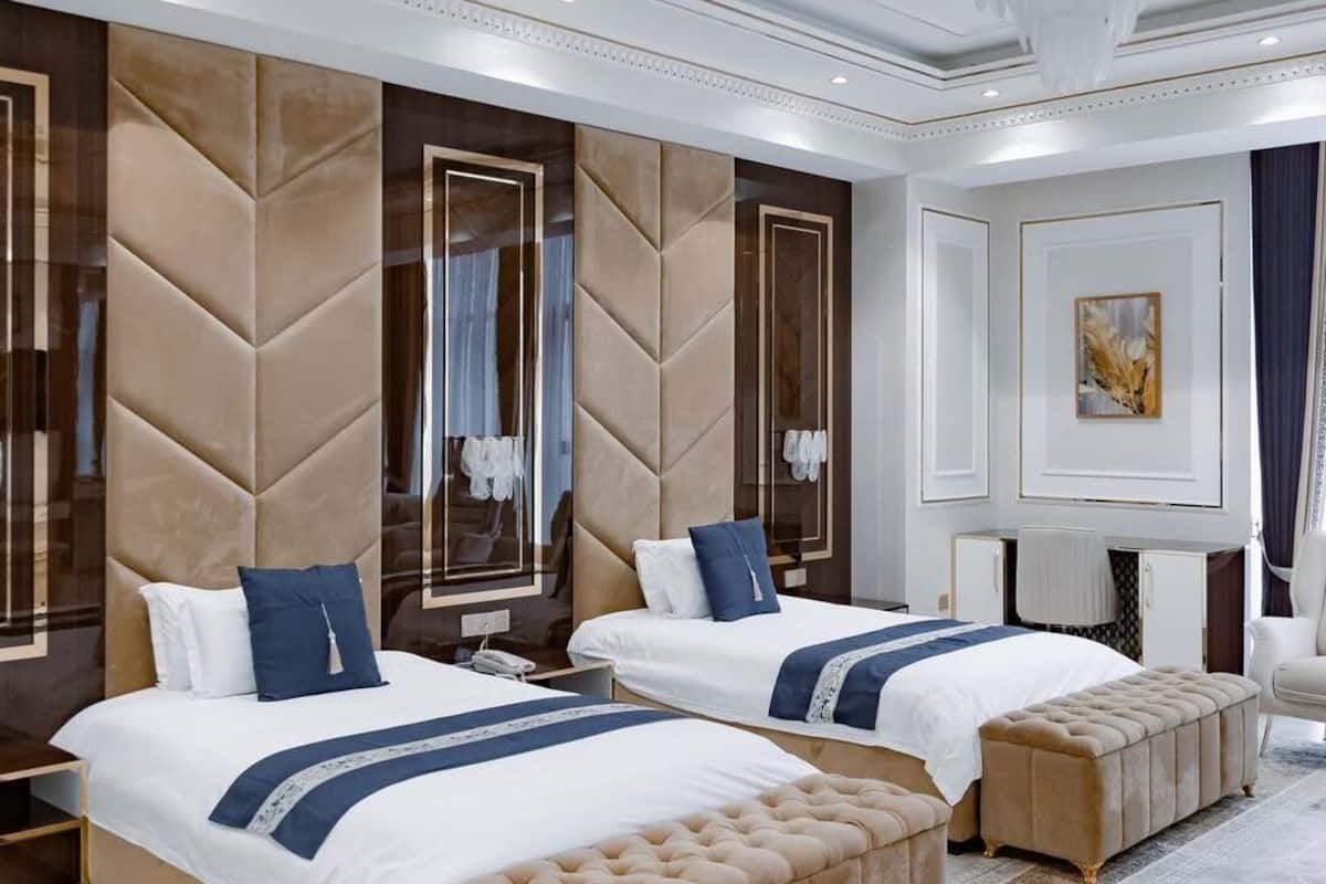 Classic Twin Room, City View | In-room safe, desk, laptop workspace, blackout drapes