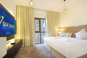 Appartamento Luxury, 2 camere da letto, balcone, vista piscina | Postazione laptop, ferro/asse da stiro, Wi-Fi gratuito