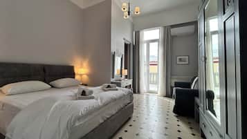 Deluxe Double Room, Balcony, Partial Ocean View | Blackout drapes, iron/ironing board, free cribs/infant beds, free WiFi