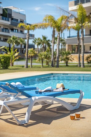 Outdoor pool, a heated pool - Sea View Playa Flamenca | 2BR 2BA | POOL, TERRACE & GYM | LONG TERM |HOLIDAYS |HOLIDAYS | (VC)