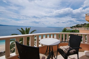 Family Apartment, Balcony, Sea View | Outdoor dining