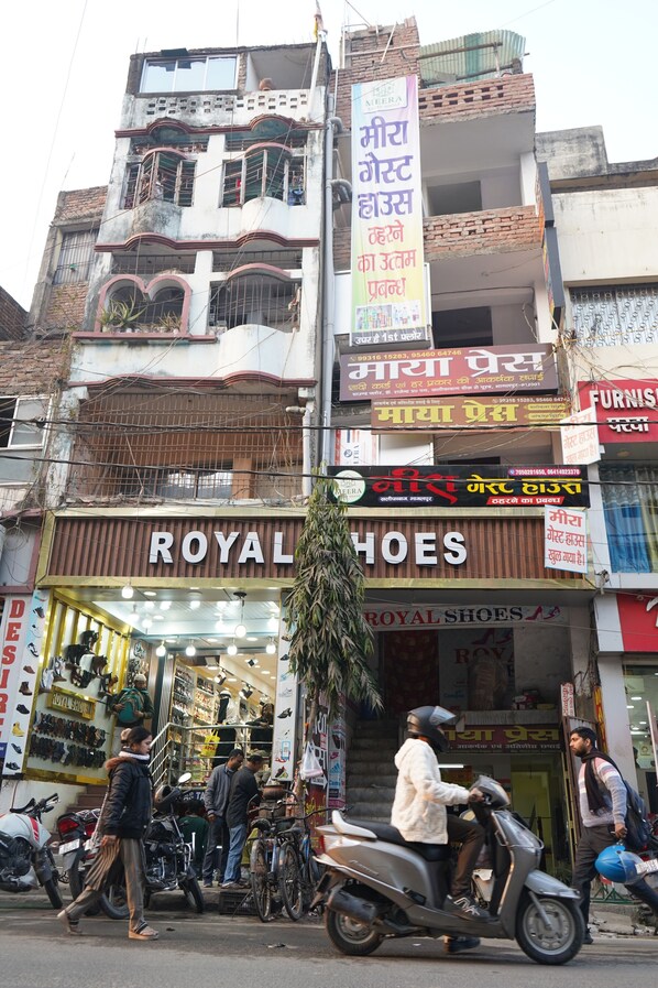 A multi-story building with a 'ROYAL SHOES' store on the ground floor. - Meera Guest House (Bhagalpur)