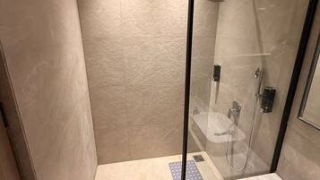 Luxury Room, City View | Bathroom | Shower, hair dryer, slippers, towels