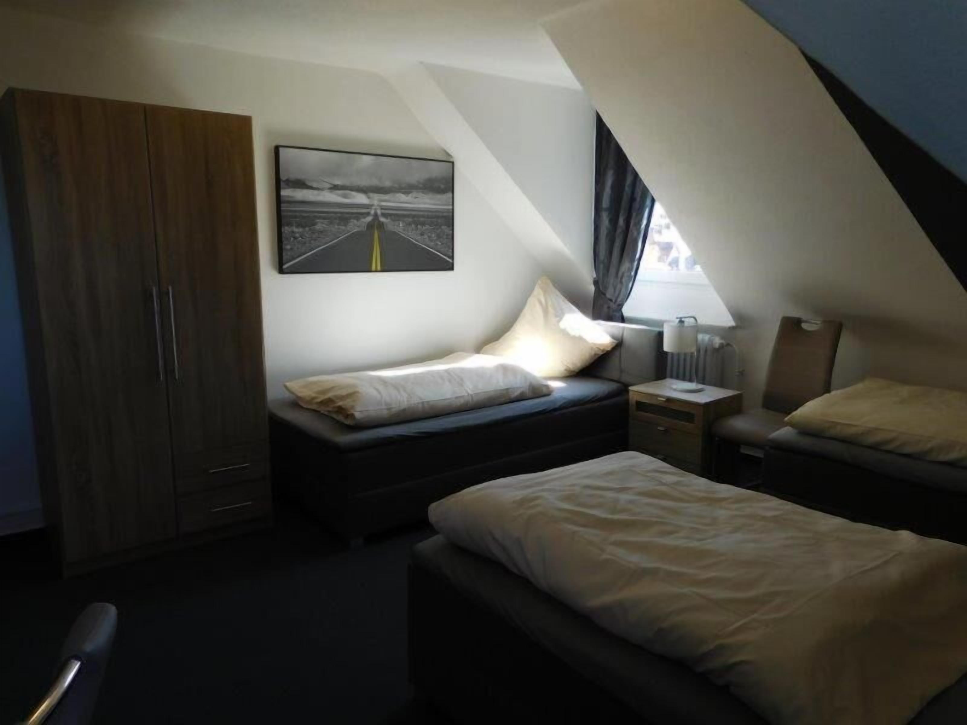 Standard Triple Room, Shared Bathroom | Desk, laptop workspace, free WiFi