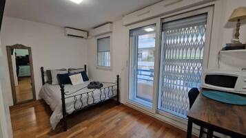 1 chambre, fer et planche à repasser, Wi-Fi, draps fournis