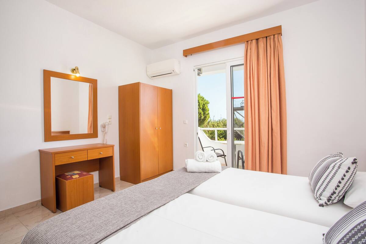 Basic Quadruple Room, Balcony, Pool View | Free WiFi