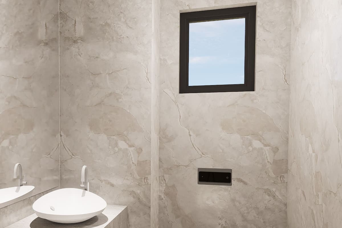 A modern bathroom with two sinks, a shower, and a toilet.