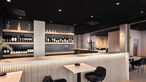 A modern bar area with a wine rack, bar counter, and seating. - Hotel Iriguibel Arrosadía (Pamplona)