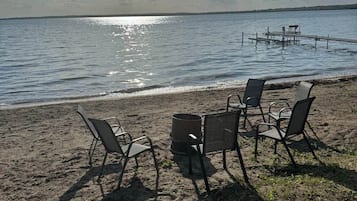 On the beach, sun-loungers, beach towels