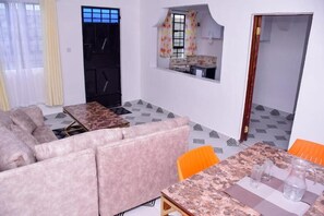 Departamento Deluxe | Área de sala de estar