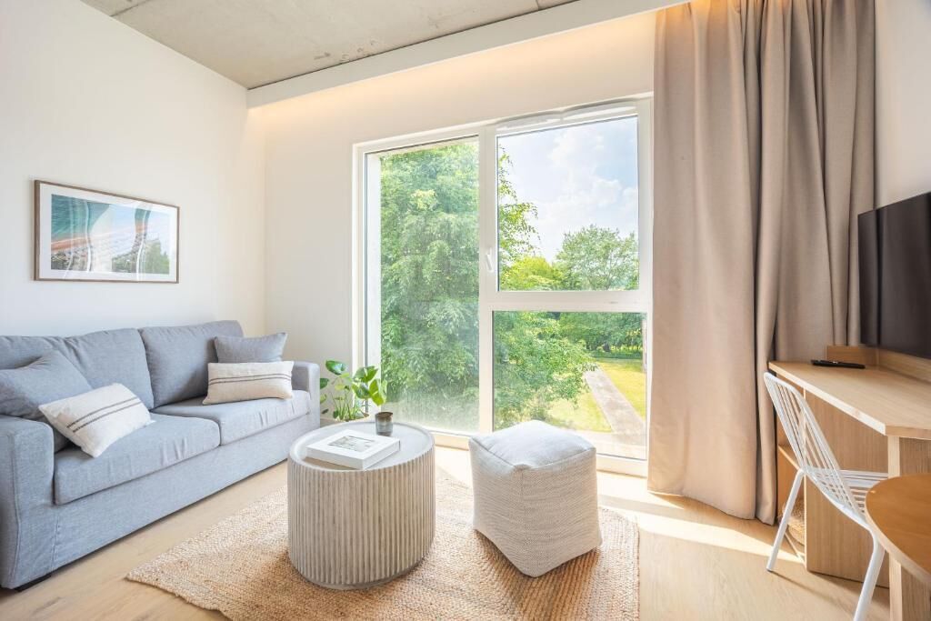 Suite, vue jardin | Coin séjour