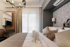 1 chambre, coffres-forts dans les chambres, fer et planche à repasser