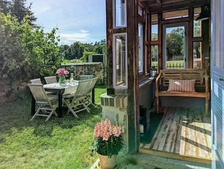 Outdoor dining. Holiday Home Sommergrün with Garden