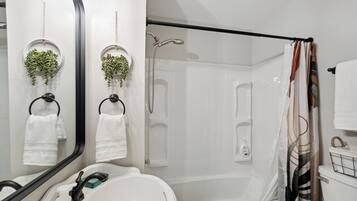 Hair dryer, towels, soap, shampoo