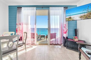 TV - Let’s Flamingle! |Gulf Views! 2 PM Check In! Pool! Hot Tub, Fitness Center Facing the Beach! Walk to Whale's Tail & More! | Fun and Funky Interior, Furnished Balcony! (Miramar Beach)