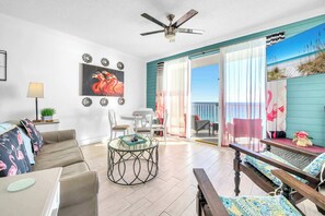 TV - Let’s Flamingle! |Gulf Views! 2 PM Check In! Pool! Hot Tub, Fitness Center Facing the Beach! Walk to Whale's Tail & More! | Fun and Funky Interior, Furnished Balcony! (Miramar Beach)