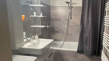 Hair dryer, towels, soap, shampoo