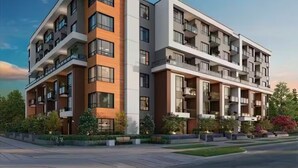 A modern multi-story residential building with balconies, a flat roof, and a landscaped front yard. - Cozy&Modern New 1 Bedroom Condo (Surrey)