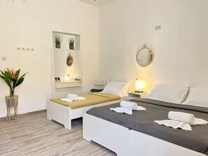 1 slaapkamer, een strijkplank/strijkijzer, wifi, beddengoed
