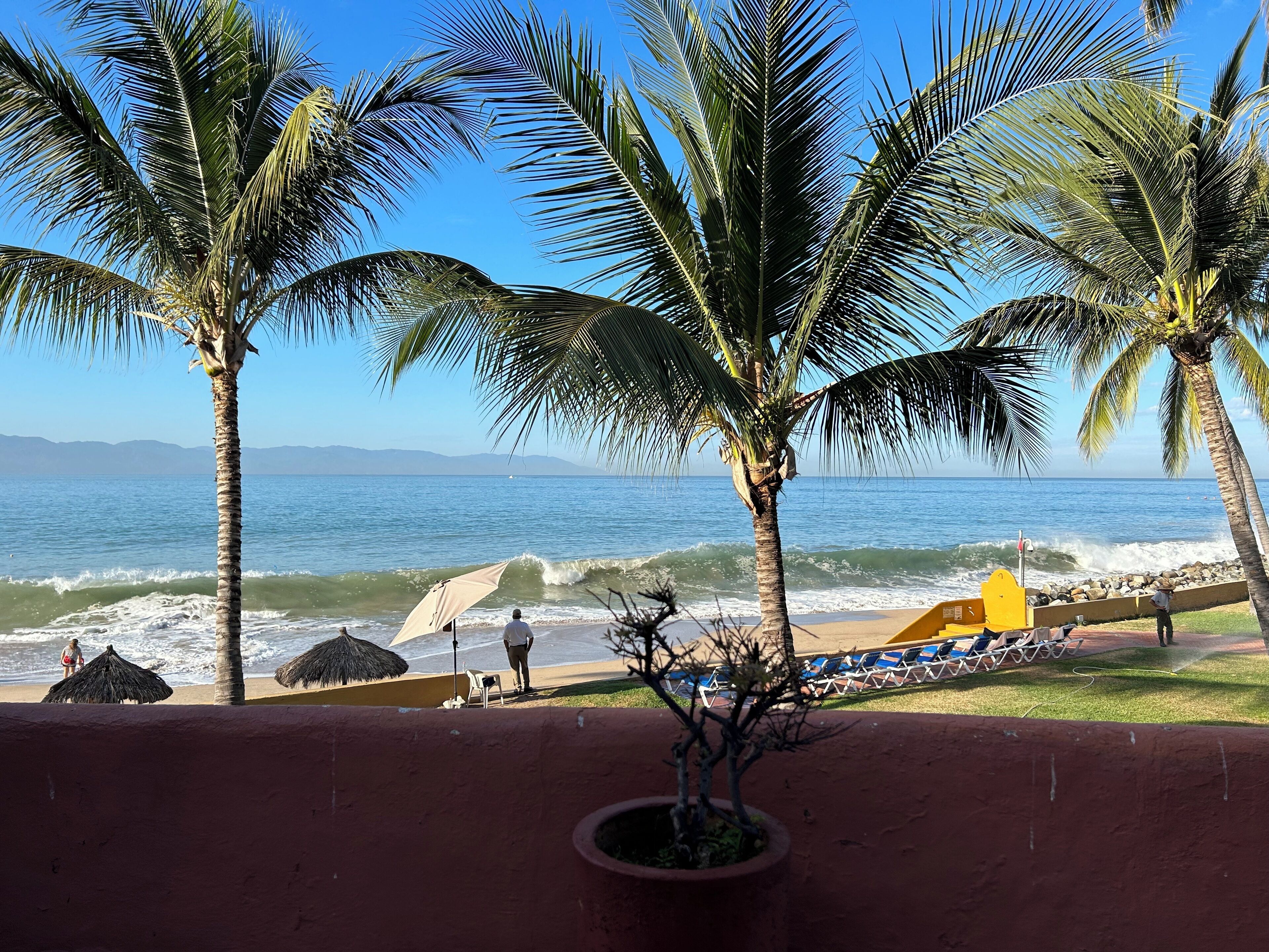 On the beach, sun loungers, beach towels