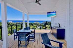 Outdoor dining - Brand New Luxury 30A Beach View Home + Heated Pool & Elevator + Walk to Beach (Santa Rosa Beach)