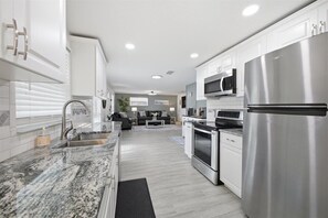 Fridge, microwave, oven, stovetop - Entire Tampa Home with Private Yard (Tampa)