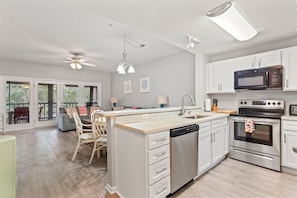Fridge, microwave, oven, stovetop - Elevated Coastal Living at Tidewater Golf Resort (North Myrtle Beach)