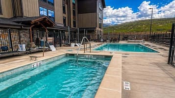 Outdoor pool, pool umbrellas, sun loungers