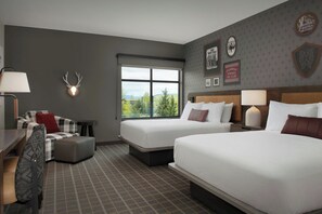 A hotel room with two beds, a desk, a chair, and a window with a view. - Towneplace Suites By Marriott Steamboat Springs (Steamboat Springs)