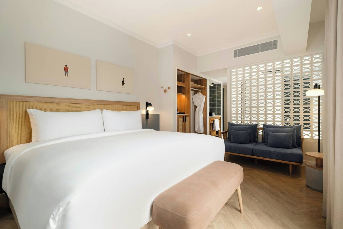Junior Suite, 1 King Bed | Premium bedding, down comforters, minibar, in-room safe