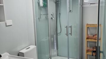 Hair dryer, towels, soap, shampoo