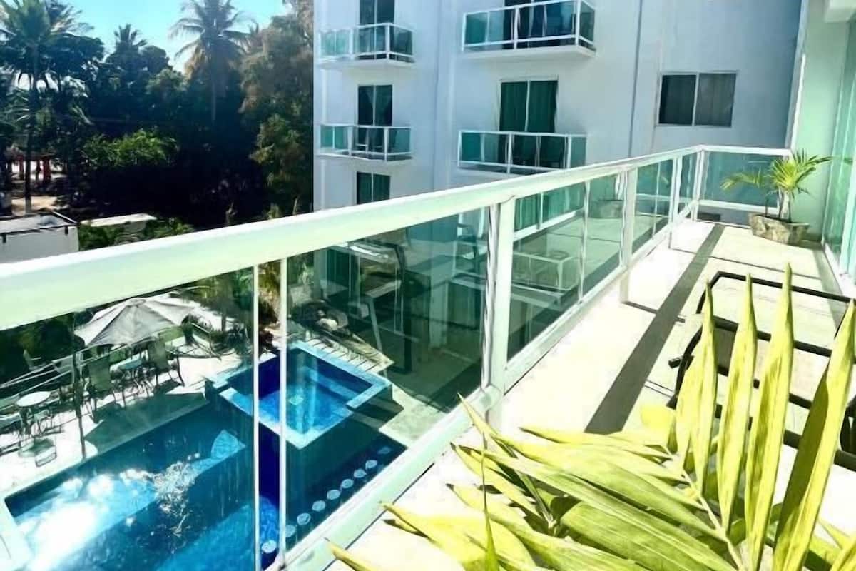 Deluxe Villa, Balcony, Pool View | Terrace/patio