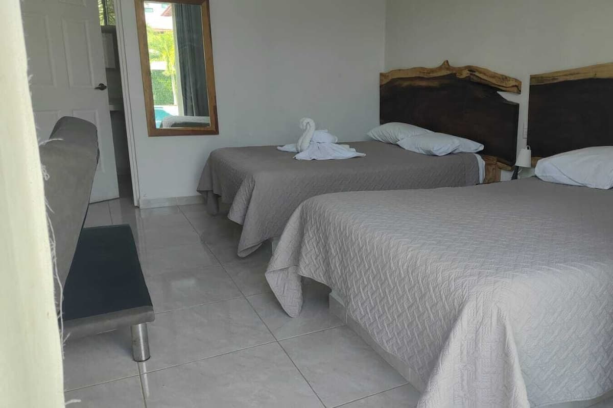 Desk, laptop workspace, iron/ironing board, cots/infant beds