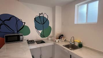 Apartment, Balcony, Pool View | Private kitchen