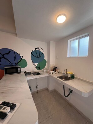 Apartment, Balcony, Pool View | Private kitchen - Gran Palma (Acapulco)