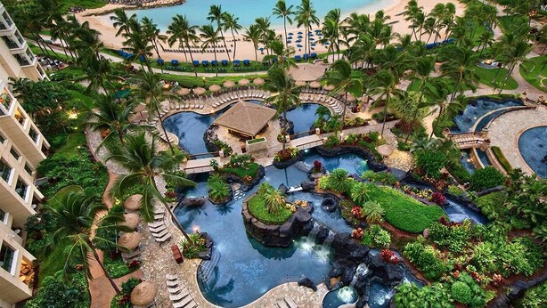A resort with multiple swimming pools, palm trees, and a beach area. - Marriott's Ko Olina Beach Club-2 Bedroom Unit-Mountain View-Full Resort Access (Kapolei)