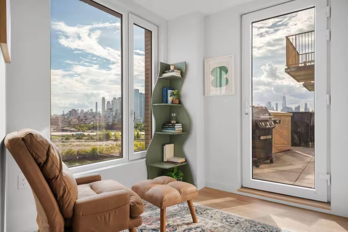 Superior Suite, 3 Bedrooms, Balcony | Living area | 50-inch TV with digital channels