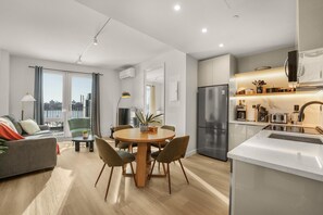 Premium Suite, 2 Bedrooms, Balcony | Private kitchen | Full-size fridge, microwave, oven, stovetop
