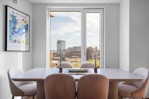 Superior Suite, 3 Bedrooms, Balcony | Dining room