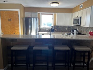 Private kitchen - Ski In/Out condo close to everything with modern kitchen, balcony and views (Ludlow)